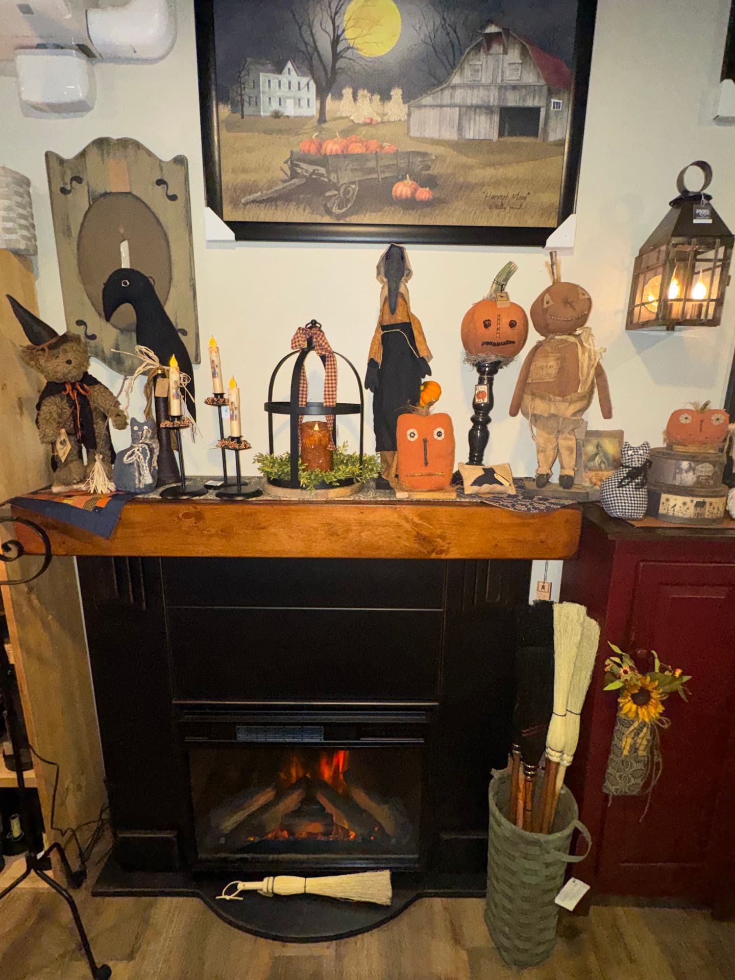 Electric Fireplace with mantle covered in Fall Decor